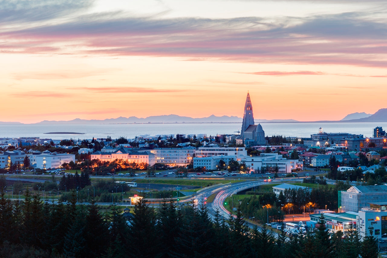 Reykjavik at sunset || Diego Delso. (2014, August 13). View of Reykjavik from Perlan, Capital Region, Iceland [Photograph]. Retrieved October 25, 2014, from Wikipedia: https://en.wikipedia.org/wiki/File:Vista_de_Reikiavik_desde_Perlan,_Distrito_de_la_Capital,_Islandia,_2014-08-13,_DD_134-145_HDR_PAN.JPG || https://creativecommons.org/licenses/by-sa/4.0/